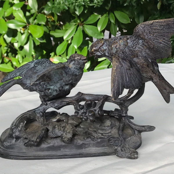 Beautifully-cast-bronze-sculpture-of-two-birds