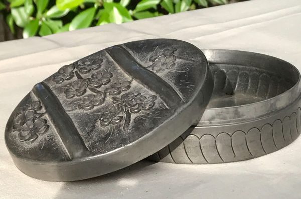 Circular-pewter-box-with-cherry-blossom-detail